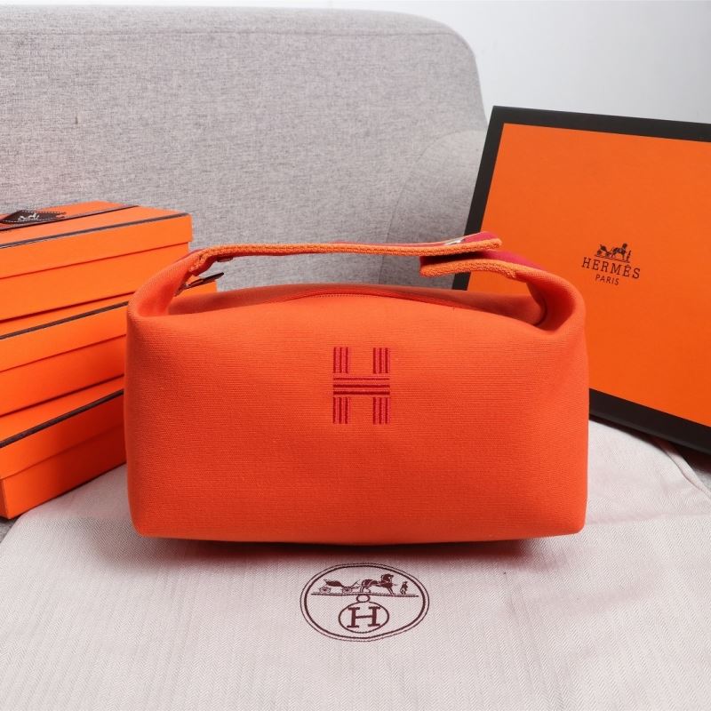 H**mes clutch bags